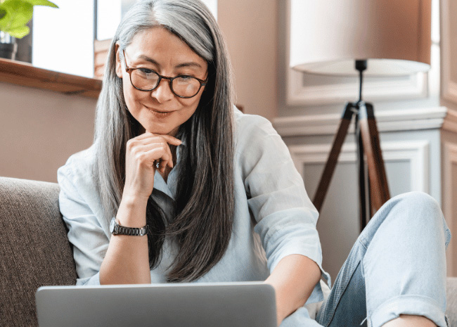 Woman browsing on computer